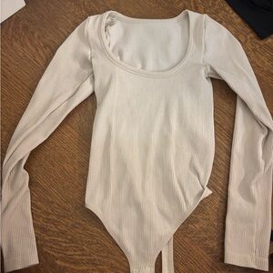 Aritzia Cream Long Sleeve ribbed bodysuit